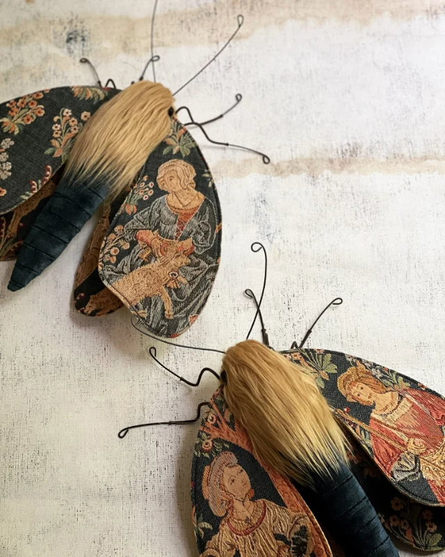 Vintage embroidered moths by Larysa Bernhardt featuring detailed tapestry