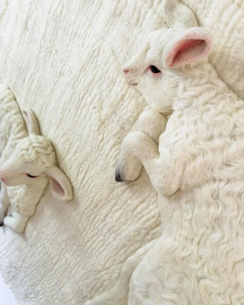 Felt Sculptured lambs by textile Holly Guertin who is inspired by animals