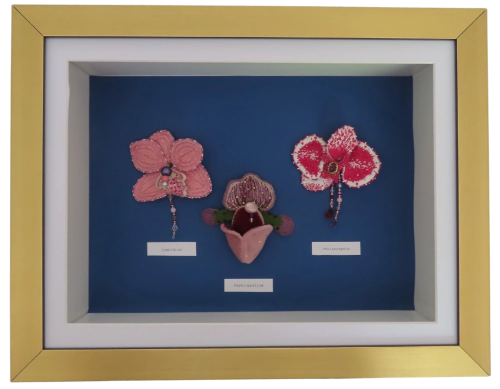 Orchids, hand embroidered by Louise Kidd